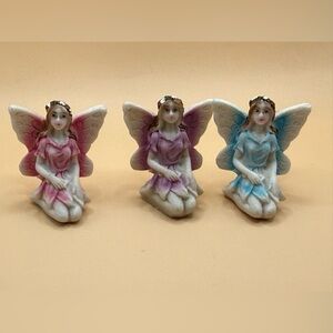 Set of Three Fairy Figurines with Pink, Purple, and Blue Wings